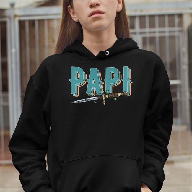 Vico_Ortiz Wearing Papi Teal Knife T Shirt